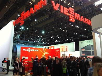 Bright orange Viessmann boiler display in Germany showing a interested customers
